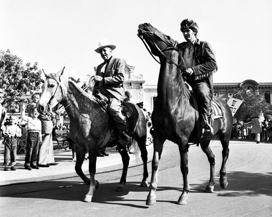 Fess Parker riding horses with Walt Disney Fess Parker riding horses with Walt Disney