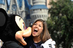 Miss California 2010 Arianna Afsar, of San Diego, Calif., meets Mickey Mouse at the Magic Kingdom.