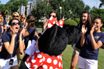 Miss Alabama 2010 Ashley Davis (left), of Dothan, Ala., gives Minnie Mouse a kiss at the Magic Kingdom.