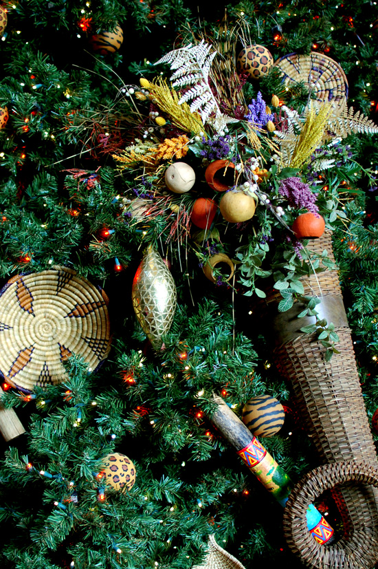 The tree at Disney’s Animal Kingdom Lodge sports baskets, masks, beads and animal-print ornaments. The tree at Disney’s Animal Kingdom Lodge sports baskets, masks, beads and animal-print ornaments.