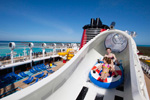 Riders aboard the AquaDuck water coaster