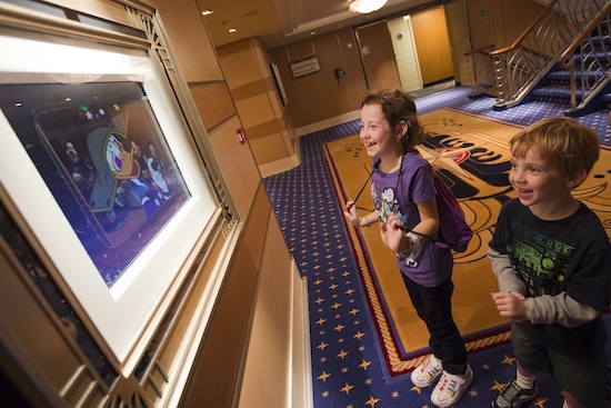 Children pause to watch framed artwork come to life – a special Disney Dream feature called Enchanted Art Children pause to watch framed artwork come to life – a special Disney Dream feature called Enchanted Art