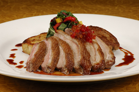 Roasted Duck Breast and Leg Confit with Cheddar Bread Pudding Roasted Duck Breast and Leg Confit with Cheddar Bread Pudding