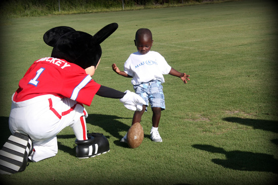 Playing Football with Mickey Mouse Playing Football with Mickey Mouse