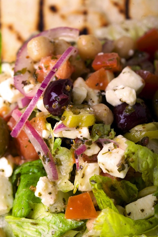 A Classic Greek Salad with Grilled Pita A Classic Greek Salad with Grilled Pita
