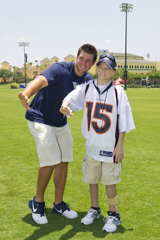 Tim Tebow and Adam Hubbs, a 16-Year-Old from Illinois at Walt Disney World Resort