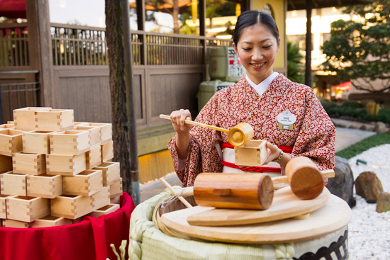 Sake Being Served in a Ceremonial Cedar Cup for the Opening of Katsura Grill at Epcot