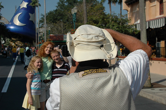 Park Goers Pose for Disney PhotoPass Photographers at Walt Disney World Resort