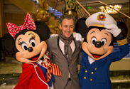 Alan Cumming with Mickey and Minnie Mouse on the Disney Fantasy