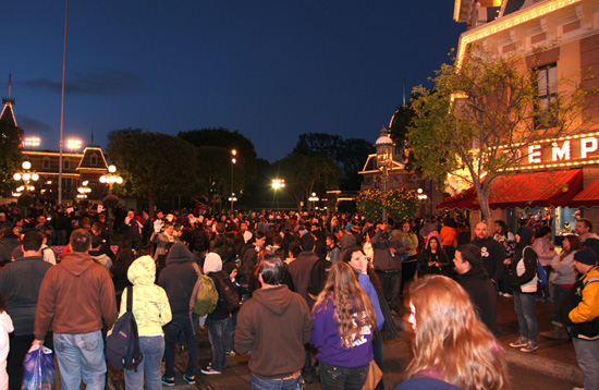 Guests Walking Down Main Street, U.S.A. in Disneyland Park