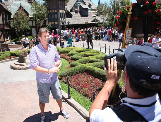 Richard Wilkins, Entertainment Editor of Australia's ‘Today’ Show on the Nine Network, in Front of King Arthur Carrousel at Disneyland Park