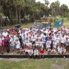 Volunteers mixed and poured 285 bags of concrete, shoveled 135 cubic yards of mulch and planted fruit trees for a custom-designed community garden.  The end result was a space for children and families to come together and enjoy the outdoors.