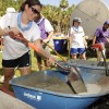 Volunteers mixed concrete, assembled equipment, shoveled mulch and came together as a community to create a whimsical playground and garden.