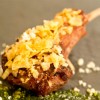 Try the Grilled Lamb Chop with Mint Pesto and Potato Crunchies at the International Food & Wine Festival at Walt Disney World Resort