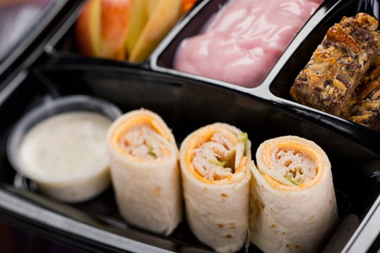 Turkey and American Cheese Wrap with Apples and Carrots with Ranch Dip, Strawberry Yogurt and Seven-Layer Cookie Bar Available with Fantasmic! Seats at Disney's Hollywood Studios