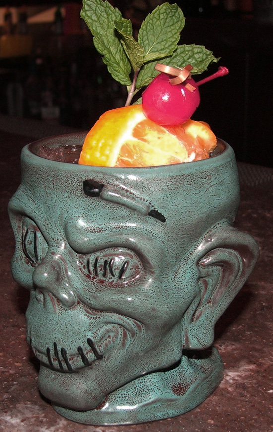 Shrunken Zombie Head Mug from Trader Sam’s Enchanted Tiki Bar at the Disneyland Hotel Shrunken Zombie Head Mug from Trader Sam’s Enchanted Tiki Bar at the Disneyland Hotel