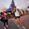 Minnie Mouse cheering the group on during the start of their 2.5-mile run.