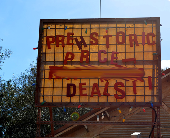 Can You Guess What Deals Dinoland, U.S.A., Features in This Sign? “Can