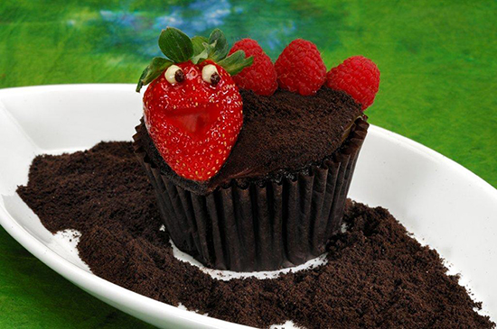 Chocolate Worms & Dirt Cupcake Featuring an Adorable Little Worm Made with a Strawberry and Fresh Raspberries Chocolate Worms & Dirt Cupcake Featuring an Adorable Little Worm Made with a Strawberry and Fresh Raspberries