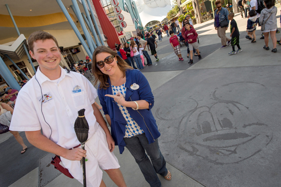 Hayes is One of 15 or so Cast Members Who Has Learned to ‘Paint’ Mickey, Minnie and Other Classic Disney Characters Using Nothing More Than His Broom and Water Hayes is One of 15 or so Cast Members Who Has Learned to ‘Paint’ Mickey, Minnie and Other Classic Disney Characters Using Nothing More Than His Broom and Water