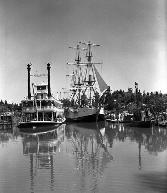 Sailing Ship Columbia Alongside the Mark Twain Riverboat at Disneyland Park in 1958 Sailing Ship Columbia Alongside the Mark Twain Riverboat at Disneyland Park in 1958