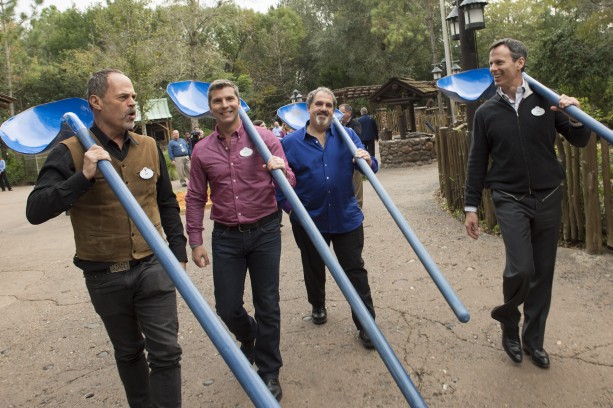 Using Na'vi-inspired shovels (left to right) Joe Rohde, creative executive,   Walt Disney Imagineering; Bruce Vaughn, chief creative executive of Walt Disney Imagineering;   Jon Landau, AVATAR producer and Tom Staggs, chairman, Walt Disney Parks and Resorts   celebrated the ceremonial groundbreaking for the largest expansion in Disney’s Animal   Kingdom history.